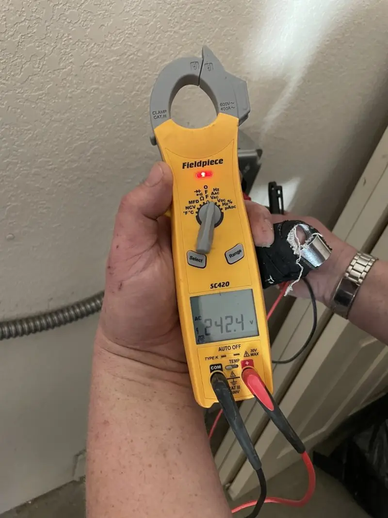 Voltage testing with clamp meter during Whole House Surge Protector in Nottawa